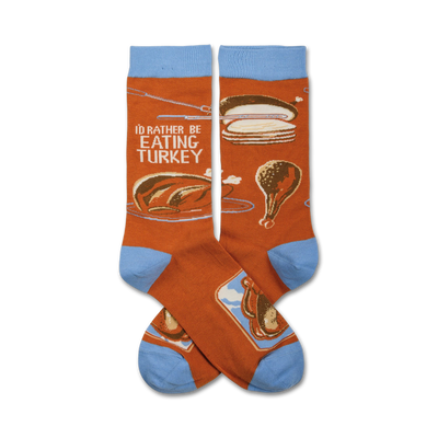 orange "i'd rather be eating turkey" socks feature whole turkey, drumstick, sliced turkey, and stuffing illustrations.  