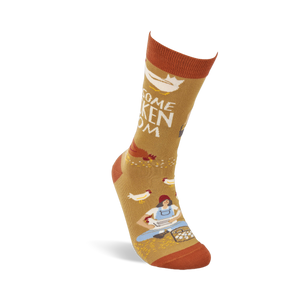 Single mustard yellow crew sock shown standing, with a woman gathering eggs and chickens visible on the design.
