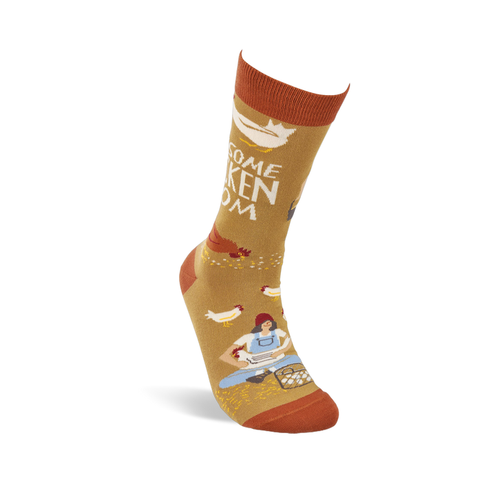 Single mustard yellow crew sock shown standing, with a woman gathering eggs and chickens visible on the design.