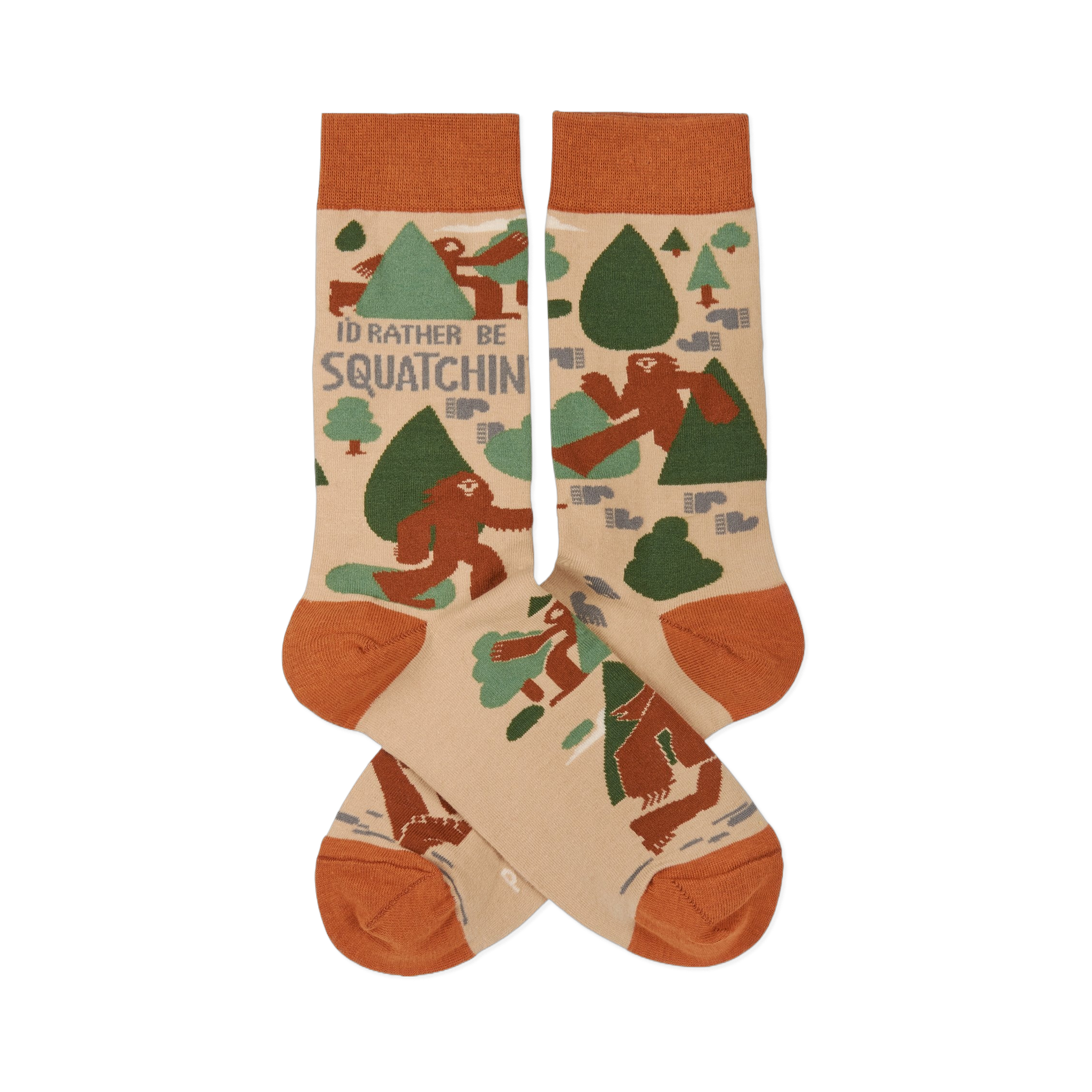 Pair of crew socks in beige, rust orange, and green, patterned with brown Sasquatch, trees, and "I'd Rather Be Squatchin'" text.