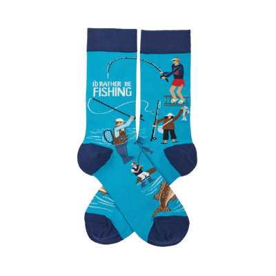 Pair of crew socks in aqua blue with navy cuffs, heels, and toes. Design shows fishermen, jumping fish, and 'I'd Rather Be Fishing' text.