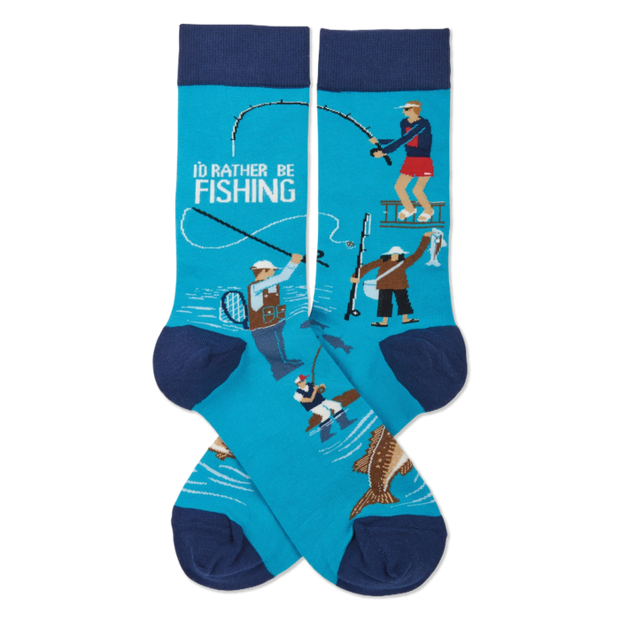 Pair of crew socks in aqua blue with navy cuffs, heels, and toes. Design shows fishermen, jumping fish, and 'I'd Rather Be Fishing' text.