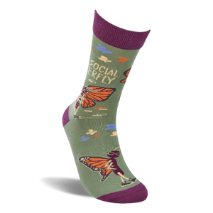 A single olive green crew sock, angled, showing a skeleton butterfly wearing sunglasses and 