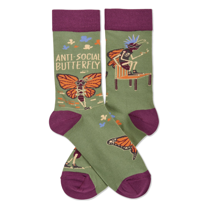 Olive green crew socks with dark purple accents. Design features skeleton butterflies in sunglasses and mohawks, plus 