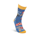 Single blue crew sock with yellow accents, angled. Shows ringmaster text, circus tent, balancing animal, and an elephant.