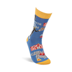 Single blue crew sock with yellow accents, angled. Shows ringmaster text, circus tent, balancing animal, and an elephant.