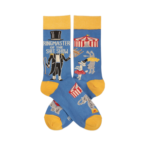 Pair of blue crew socks with yellow accents. Features a ringmaster, text 