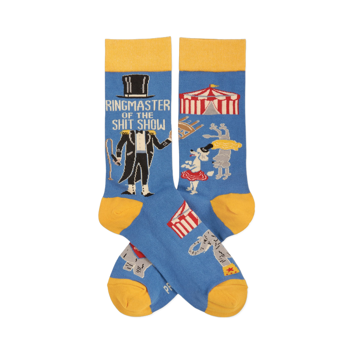 Pair of blue crew socks with yellow accents. Features a ringmaster, text 