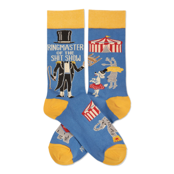 Pair of blue crew socks with yellow accents. Features a ringmaster, text "Ringmaster Of The Shitshow", and circus animals.