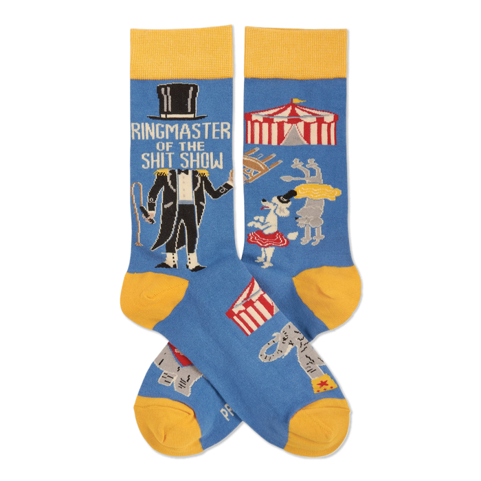 Pair of blue crew socks with yellow accents. Features a ringmaster, text 
