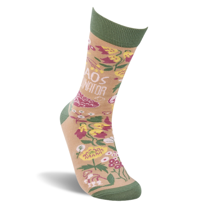 Single tan and olive green 'Chaos Coordinator' crew sock with floral pattern, shown upright on a white background.