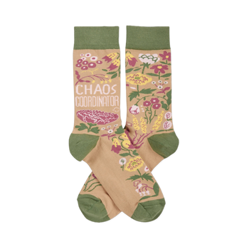 Pair of crew socks with tan background, olive green cuffs/heels/toes. Pink, yellow, white flowers & 'CHAOS COORDINATOR' text.