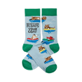 A pair of light blue crew socks with green cuffs, heels, and toes, featuring cartoon goats floating in colorful inner tubes and text.