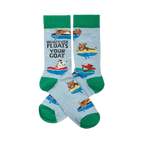 A pair of light blue crew socks with green cuffs, heels, and toes, featuring cartoon goats floating in colorful inner tubes and text.