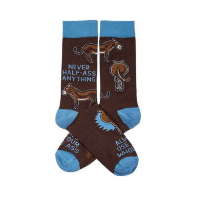 Pair of brown crew socks with light blue cuffs and toes. They feature donkeys and the text "NEVER HALF-ASS ANYTHING".