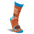 Single orange crew sock standing. 'I DRINK COFFEE FOR YOUR PROTECTION' text, woman with mug, steaming coffee cup. Blue cuff, heel, toe.