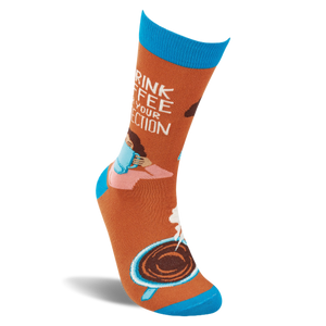 Single orange crew sock standing. 'I DRINK COFFEE FOR YOUR PROTECTION' text, woman with mug, steaming coffee cup. Blue cuff, heel, toe.