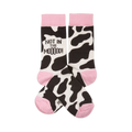 Pair of crew socks with black and white cow print, pink cuffs, heels, and toes. One sock reads "NOT IN THE MOOOOD!".