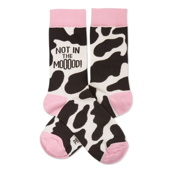 Pair of crew socks with black and white cow print, pink cuffs, heels, and toes. One sock reads "NOT IN THE MOOOOD!".