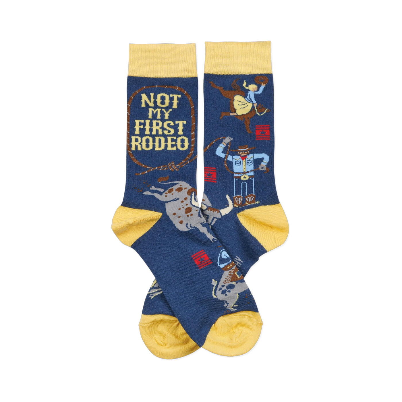 Pair of dark blue crew socks with yellow cuffs, heels, and toes. Design includes cowboys, bulls, and "NOT MY FIRST RODEO" text.