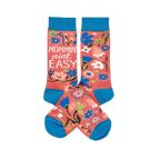 Two coral pink crew socks with blue cuffs, heels, and toes, featuring a colorful floral pattern and "MOMMIN' AIN'T EASY" text.