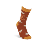 Rust sock with white chickens and "Fluent In Fowl Language" text, featuring yellow cuff, heel, and toe.