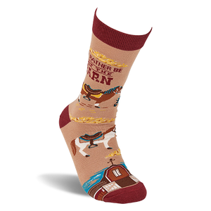 Single tan crew sock with reddish-brown accents, featuring horses, a barn, and 'I'd Rather Be At The Barn' text, angled upwards.