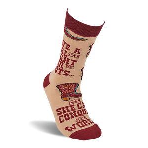 Single tan crew sock standing upright, showing a maroon cuff and text 'GIVE A GIRL THE RIGHT PAIR OF BOOTS'.