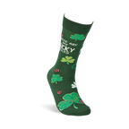 A single dark green crew sock stands upright, displaying green and white clovers, red ladybugs, and text.