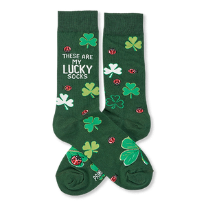 Pair of dark green crew socks with light green and white clovers and red ladybugs. One sock reads 