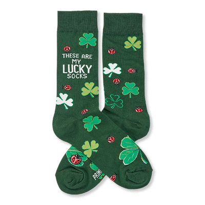Pair of dark green crew socks with light green and white clovers and red ladybugs. One sock reads "THESE ARE MY LUCKY SOCKS."