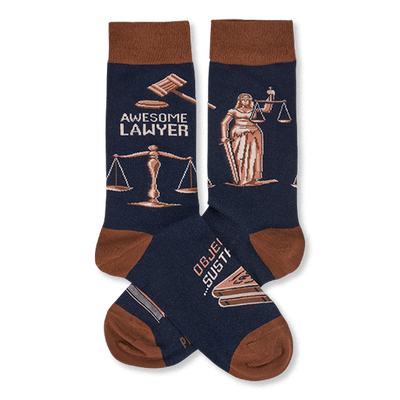 Pair of navy crew socks with brown cuffs, heels, and toes. Design includes "Awesome Lawyer" text, gavels, Lady Justice, and scales.