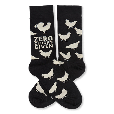 Pair of black crew socks with white chicken and rooster silhouettes. One sock displays "ZERO CLUCKS GIVEN" text.