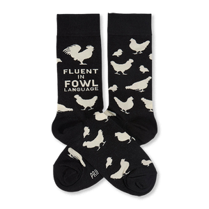 Two black crew socks with white chicken illustrations and 