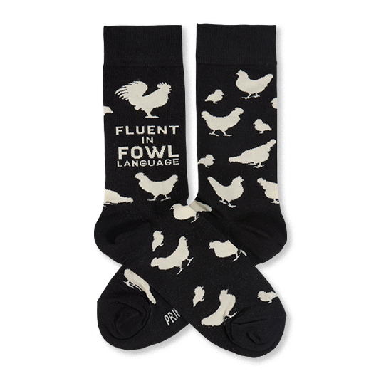 Two black crew socks with white chicken illustrations and 