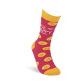 Single pink crew sock with yellow smiley faces standing upright on a white background. Yellow cuff, heel, and toe.
