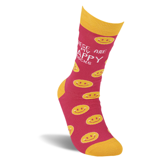 Single pink crew sock with yellow smiley faces standing upright on a white background. Yellow cuff, heel, and toe.