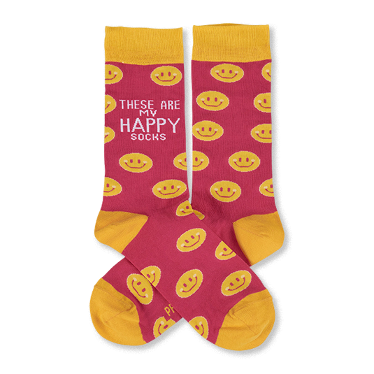 Pair of pink crew socks with yellow smiley faces. Yellow cuffs, heels, and toes. One sock features 'These Are My Happy Socks' text.