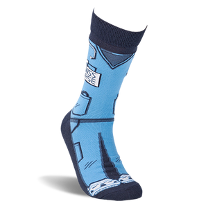 Single 'Badass Nurse' sock standing upright, showing light blue scrubs design, stethoscope, and badge.