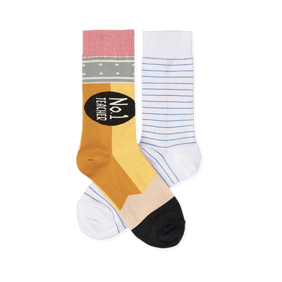 Pair of mismatched crew socks. One looks like a pencil with 'No.1 Teacher' text. The other is white with blue lines like notebook paper.