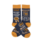 Pair of navy crew socks with orange cuffs, heels, and toes, featuring gold and white text graphics like 'Mother Of The Freakin' Year'.