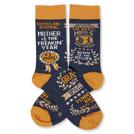 Pair of navy crew socks with orange cuffs, heels, and toes, featuring gold and white text graphics like 'Mother Of The Freakin' Year'.