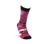 Single purple crew sock shown at an angle, featuring Mothman, alien, and UFO patterns with black cuff and toe.