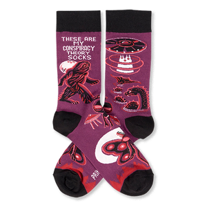Pair of purple crew socks with black cuffs, heels, and toes, featuring Bigfoot, UFOs, aliens, and Mothman designs.