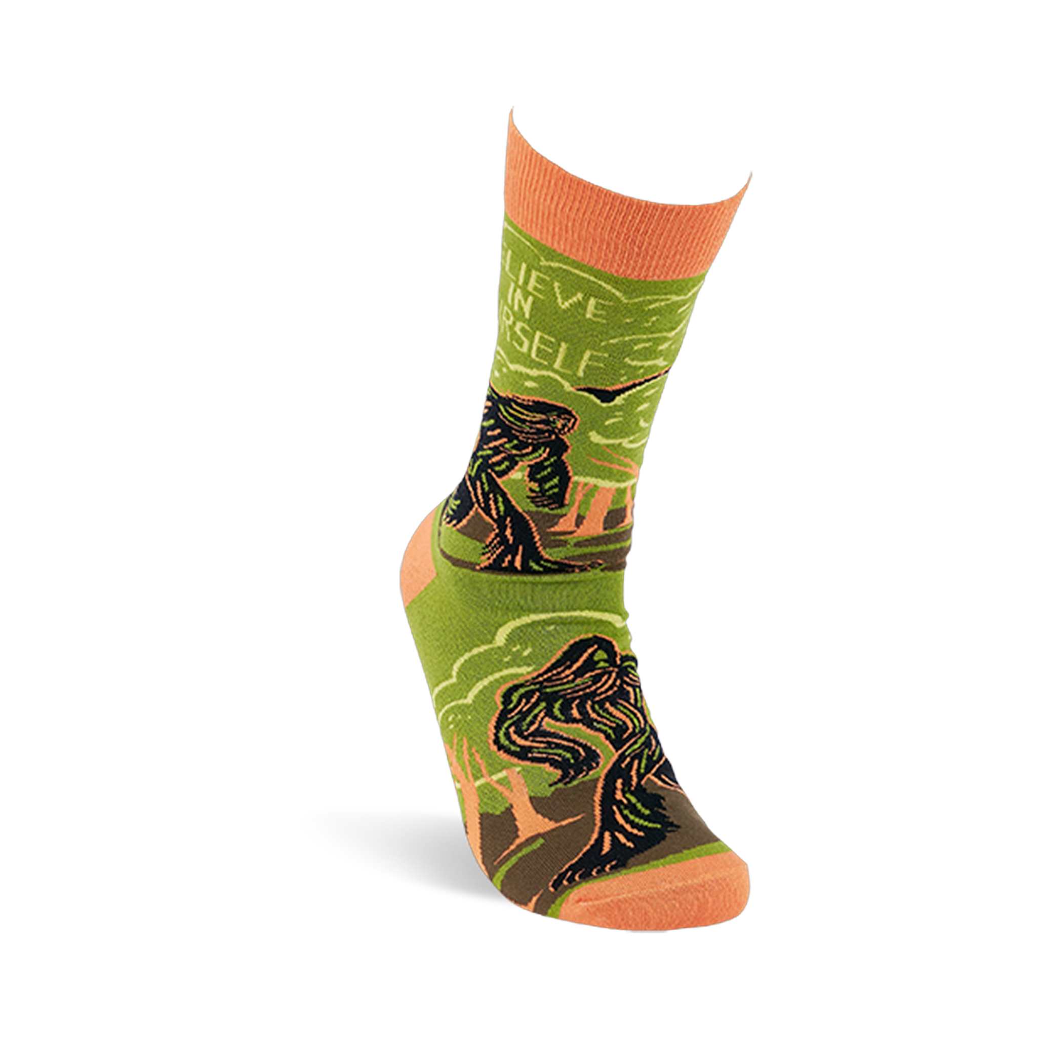 A single olive green and orange Bigfoot crew sock standing upright, showing the creature, forest, and 'Believe In Yourself' text.