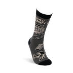 Side view of a single dark gray crew sock with black details, showing a raccoon in a trash can and 'STAY TRASHY' text.