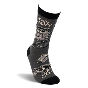 Side view of a single dark gray crew sock with black details, showing a raccoon in a trash can and 'STAY TRASHY' text.