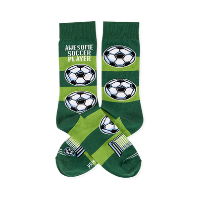 Pair of soccer socks with dark and lime green stripes, 'AWESOME SOCCER PLAYER' text, soccer balls, and a goal net.