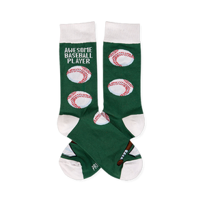 Pair of dark green crew socks with white cuffs, heels, and toes. One sock reads 
