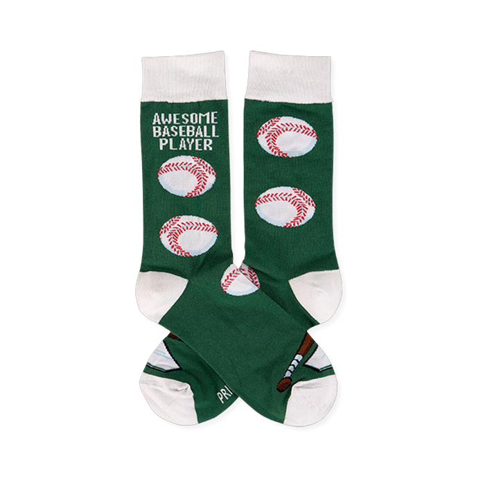 Pair of dark green crew socks with white cuffs, heels, and toes. One sock reads 